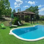 La Casa De La Parcela Ferienhaus *